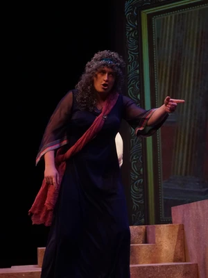 Alex Walley, tenor, on stage singing the role of Arnalta in The Coronation of Poppea, opera